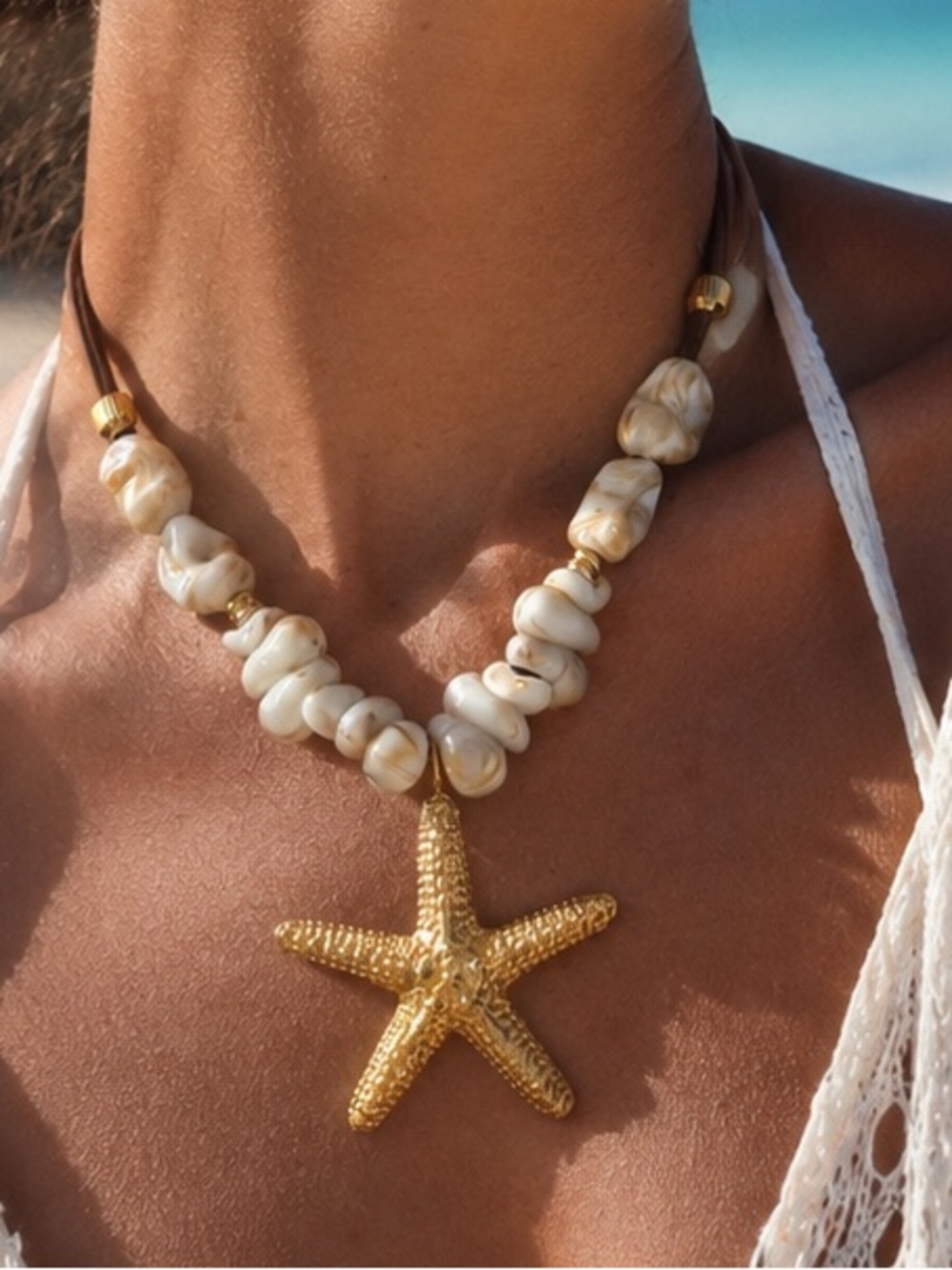 Gold Starfish Pendant Necklace with Cream Beads